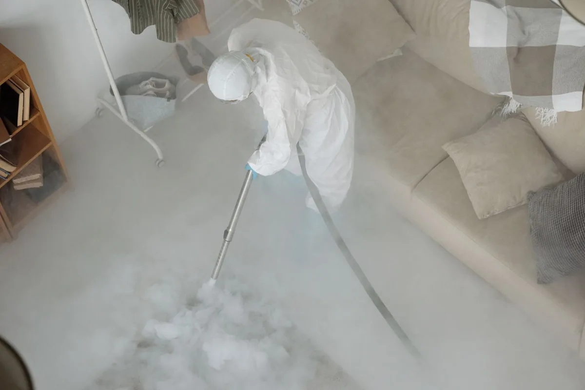 Biohazard cleanup technician in protective equipment, Conestoga, PA